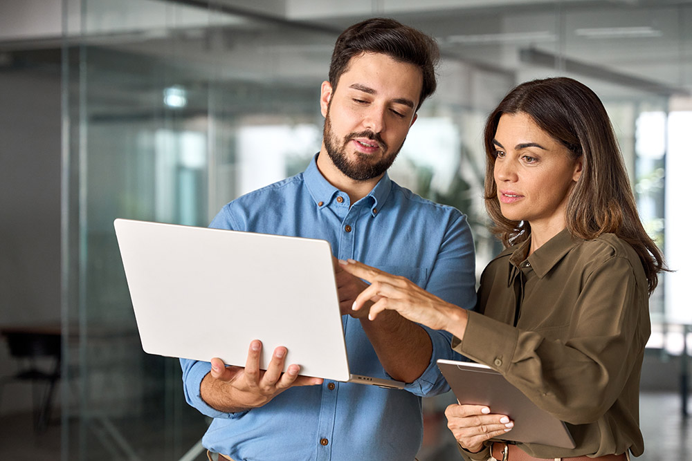 Two,Busy,Professional,Business,People,Working,In,Office,With,Computer. Should I combine my pensions into one pot?