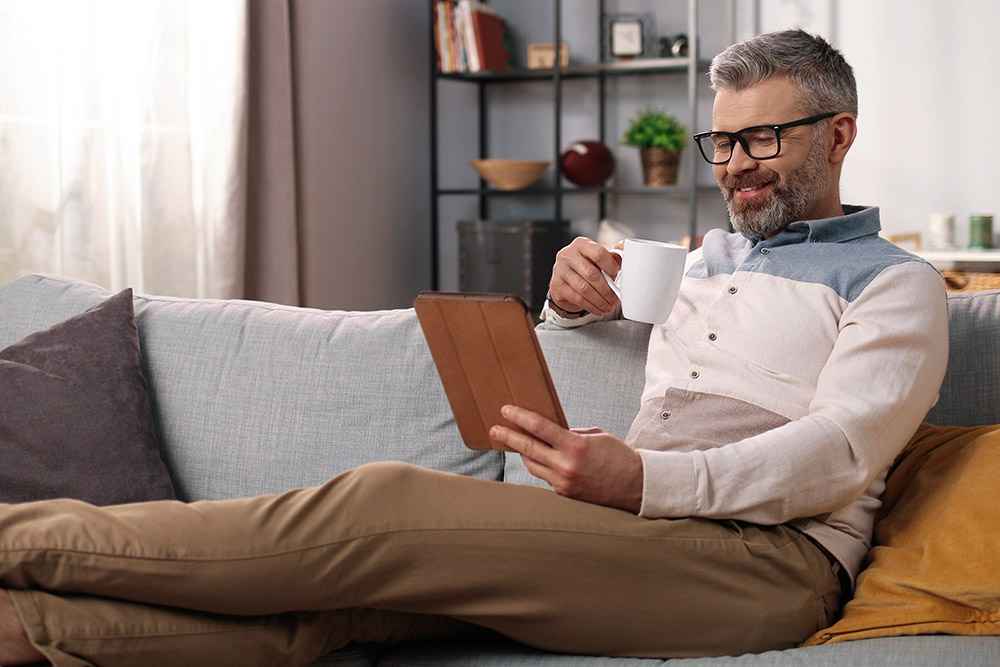 Middle-aged,Handsome,Mature,Caucasian,Man,In,Glasses,Resting,On,Sofa Should I combine my pensions into one pot?