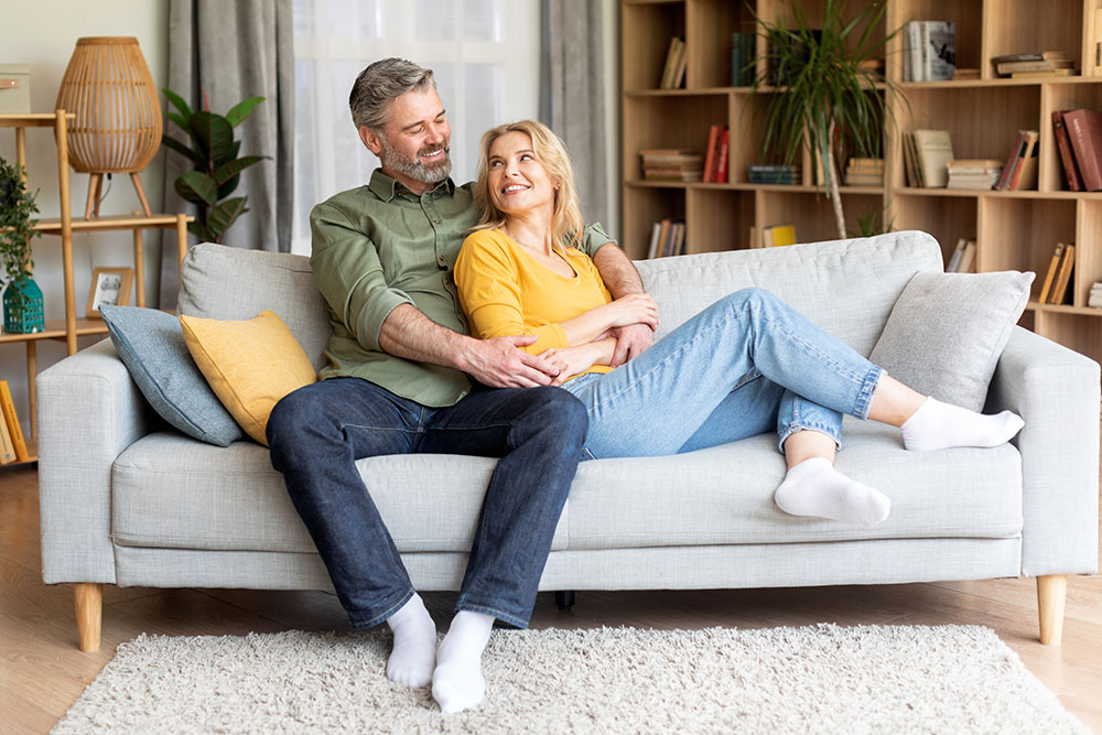 Romantic,Happy,Middle,Aged,Couple,Relaxing,On,Couch,At,Home, Should I combine my pensions into one pot?